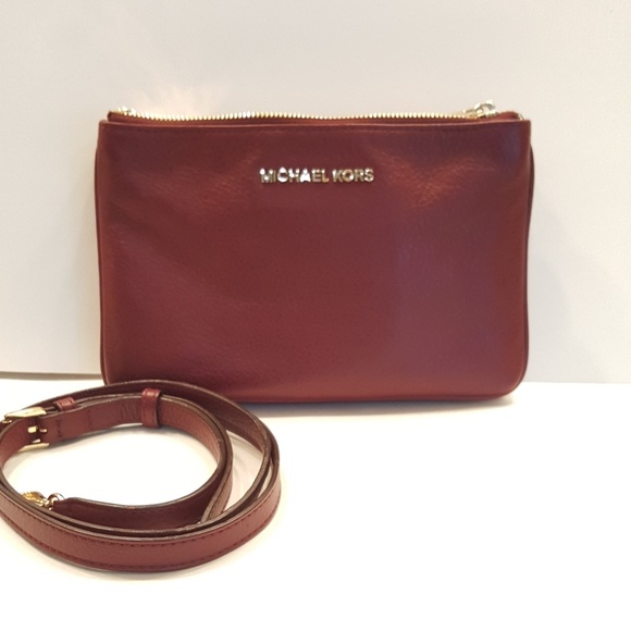 Michael Kors Handbags - Michael Kors leather cross body bag.
